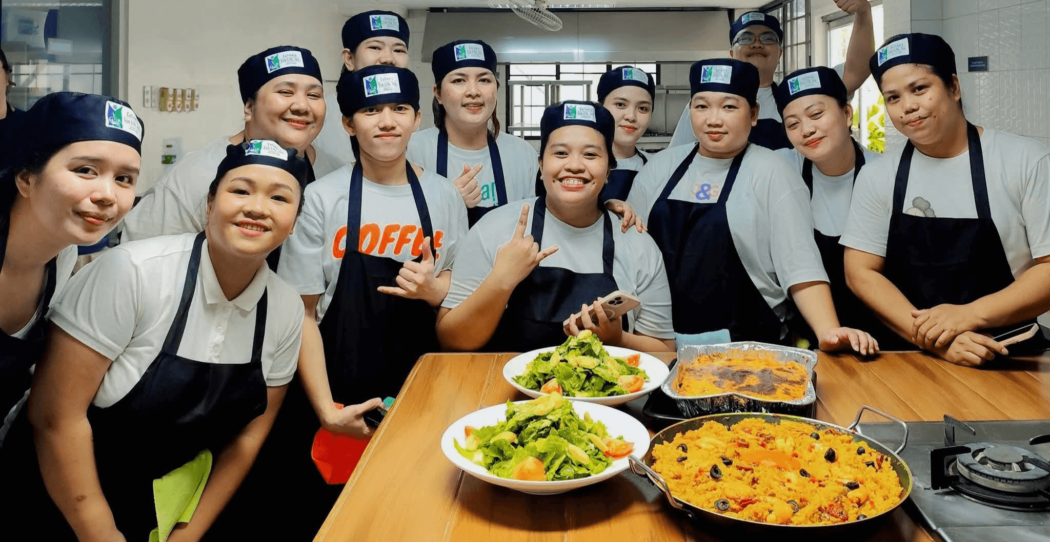Scholars preparing food during culinary training